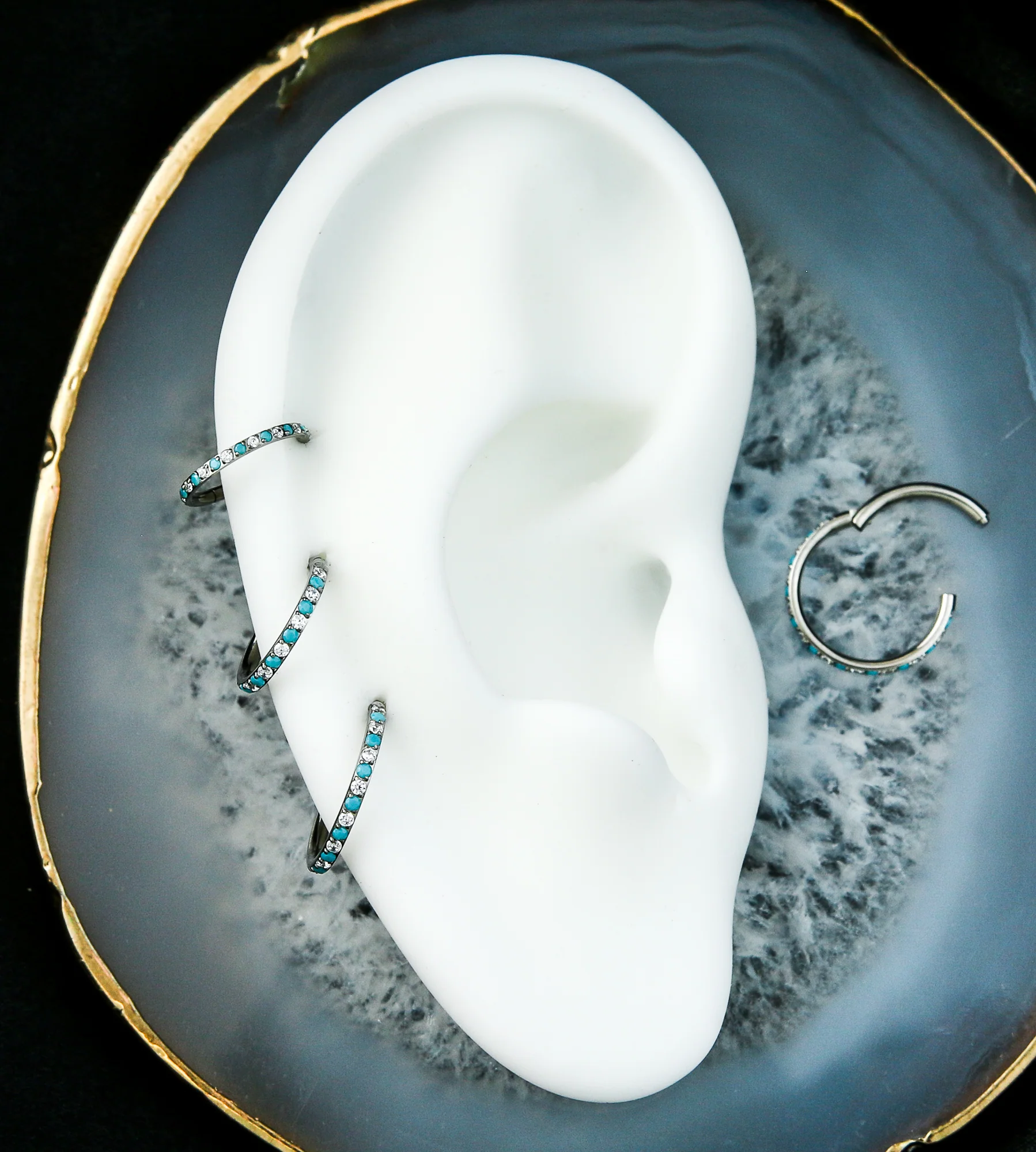 Side Facing Clear CZ Turquoise Titanium Hinged Segment Ring - Image 2